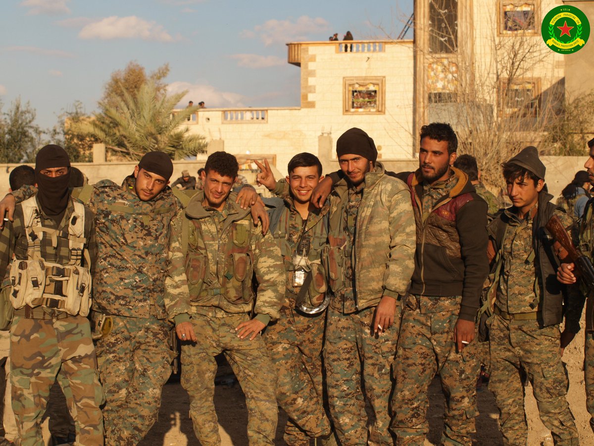 YPJInternation3's tweet photo. Few #SDF units left #Baghuz-front to go home,after succefully fighting #ISIS. Together they commemorate the Sehids & celebrated. Remember all meaning of this war, there are no words describing this atmosphere, looking in all this beautiful faces, reading in their eyes. #YPJIntDeZ https://t.co/trN5LgOLS4