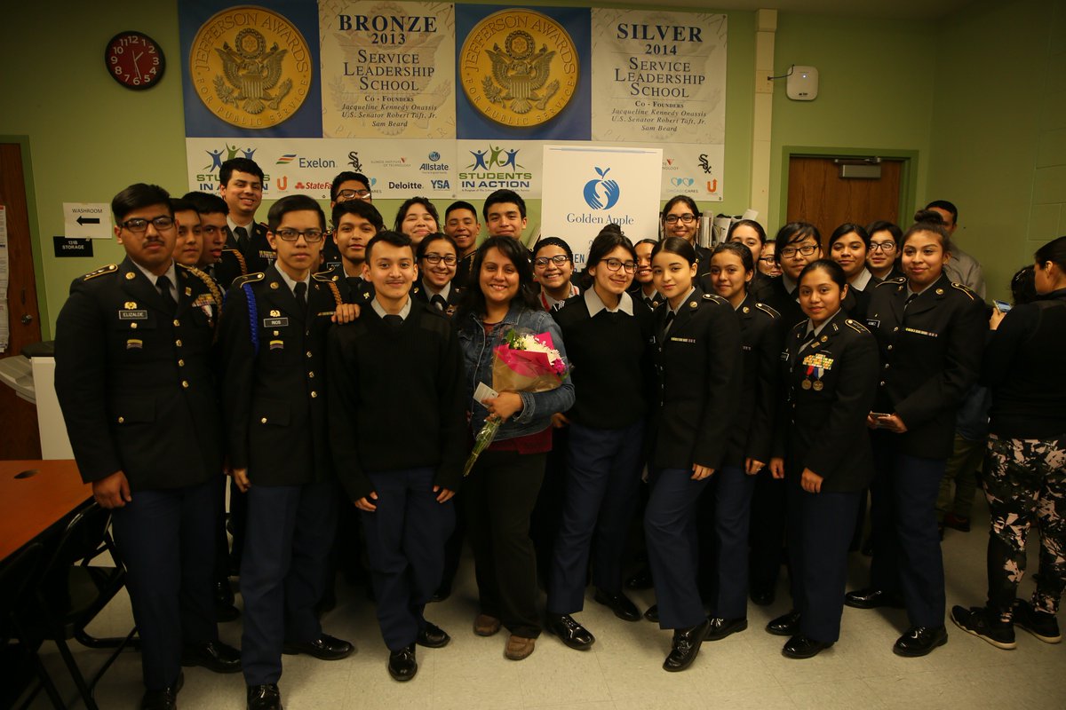 Teach_Golden's tweet photo. We had so much fun surprising @lraygoza2 with the 2019 Golden Apple Award for Excellence in Teaching at Phoenix Military Academy. Thanks to @ChicagosMayor for joining us to honor this amazing educator! @PMAFirebirds #TeachGolden https://t.co/nJ0zhpO5MR