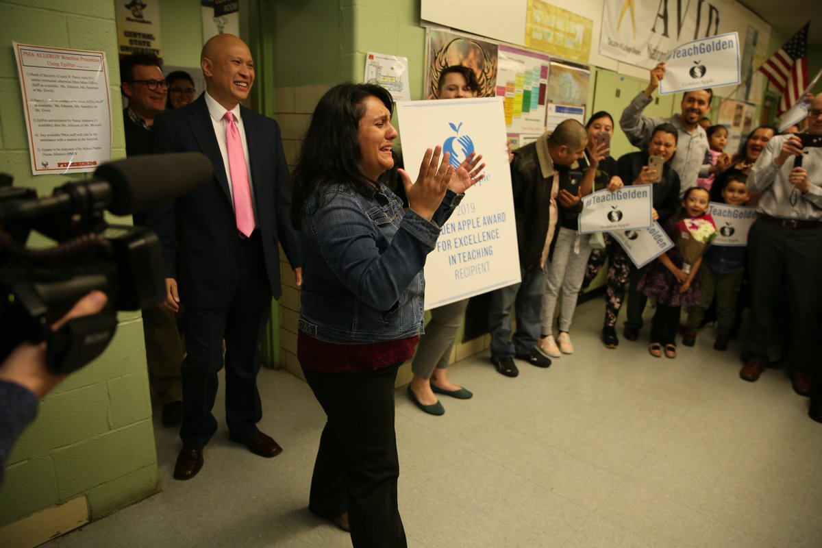 Teach_Golden's tweet photo. We had so much fun surprising @lraygoza2 with the 2019 Golden Apple Award for Excellence in Teaching at Phoenix Military Academy. Thanks to @ChicagosMayor for joining us to honor this amazing educator! @PMAFirebirds #TeachGolden https://t.co/nJ0zhpO5MR