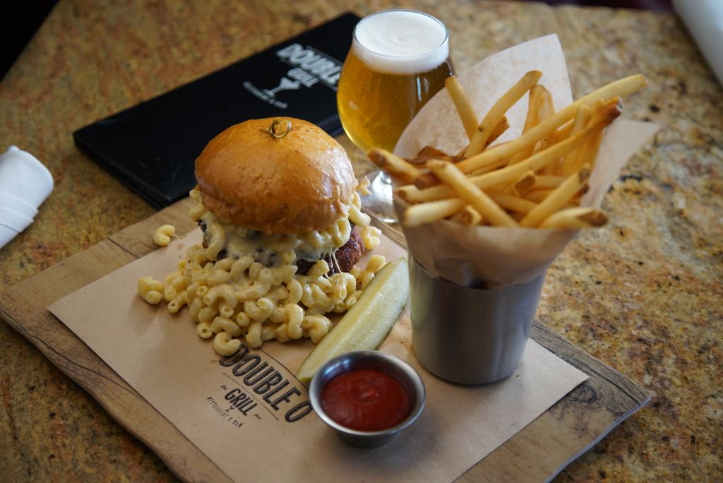 DoubleOGrill's tweet photo. Have you tried our new Mac ‘n Cheese Burger? It’s a little messy but totally worth it! 😋🍔🧀 #doubleogrill #somethingforeveryone https://t.co/ZgWbm7RdmV