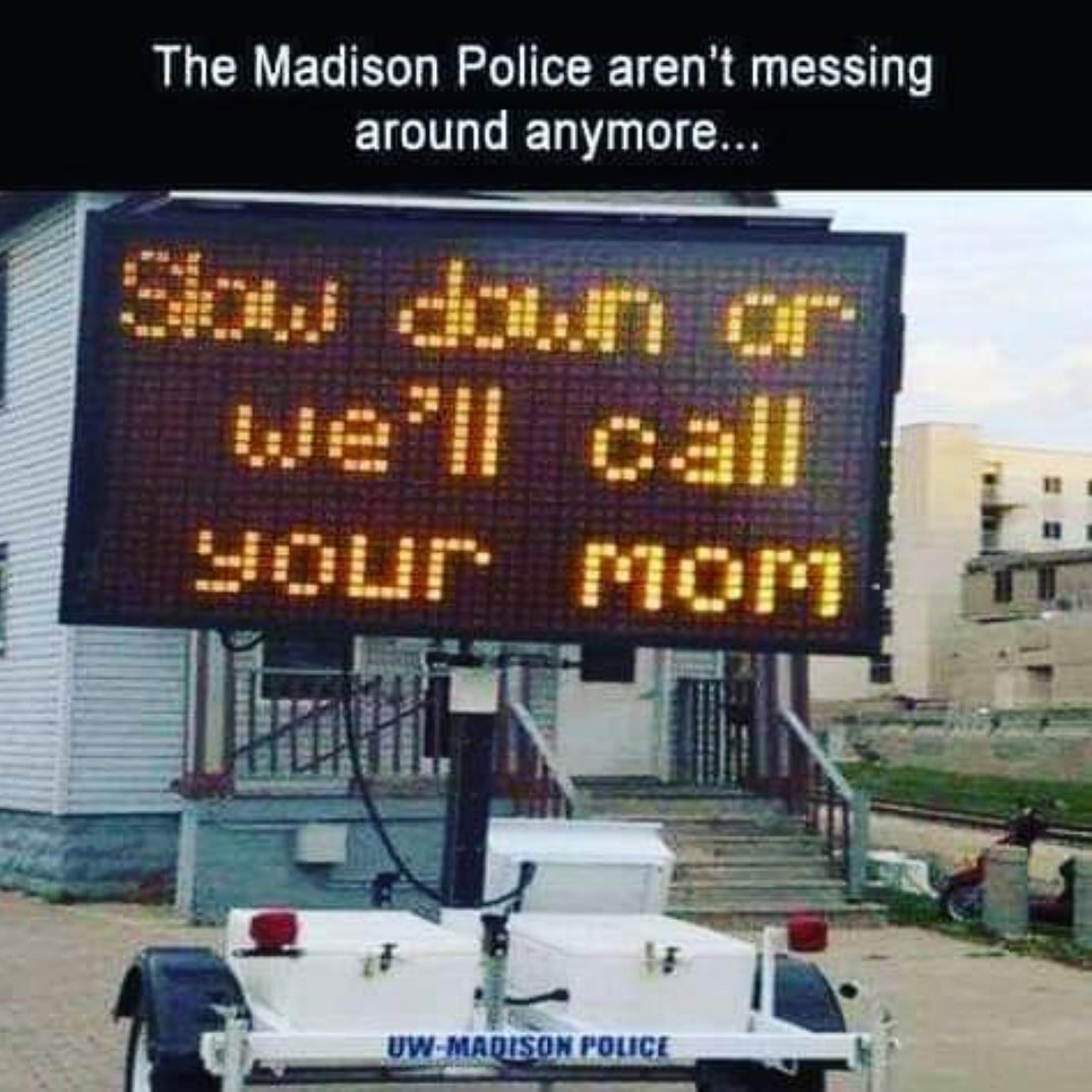 Humanize911's tweet image. My buddy with the @UWMadisonPolice confirmed this is a real sign! 😂 #CopHumor #DispatchHumor #ThinGoldLine #ThinBlueLine