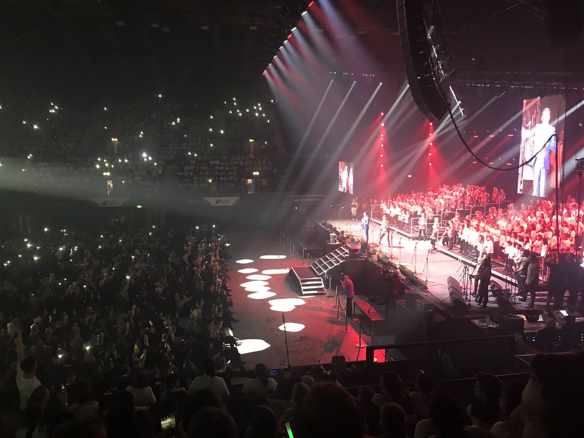 PiltonBluecoat's tweet photo. WOW!!! That was amazing!! The children did fantastic singing and dancing and waved glow sticks and screamed A LOT!! What an amazing experience. We are now on the coach on our way home. We will update you with a more exact ETA as we approach Devon. https://t.co/u6CRkcvqaf
