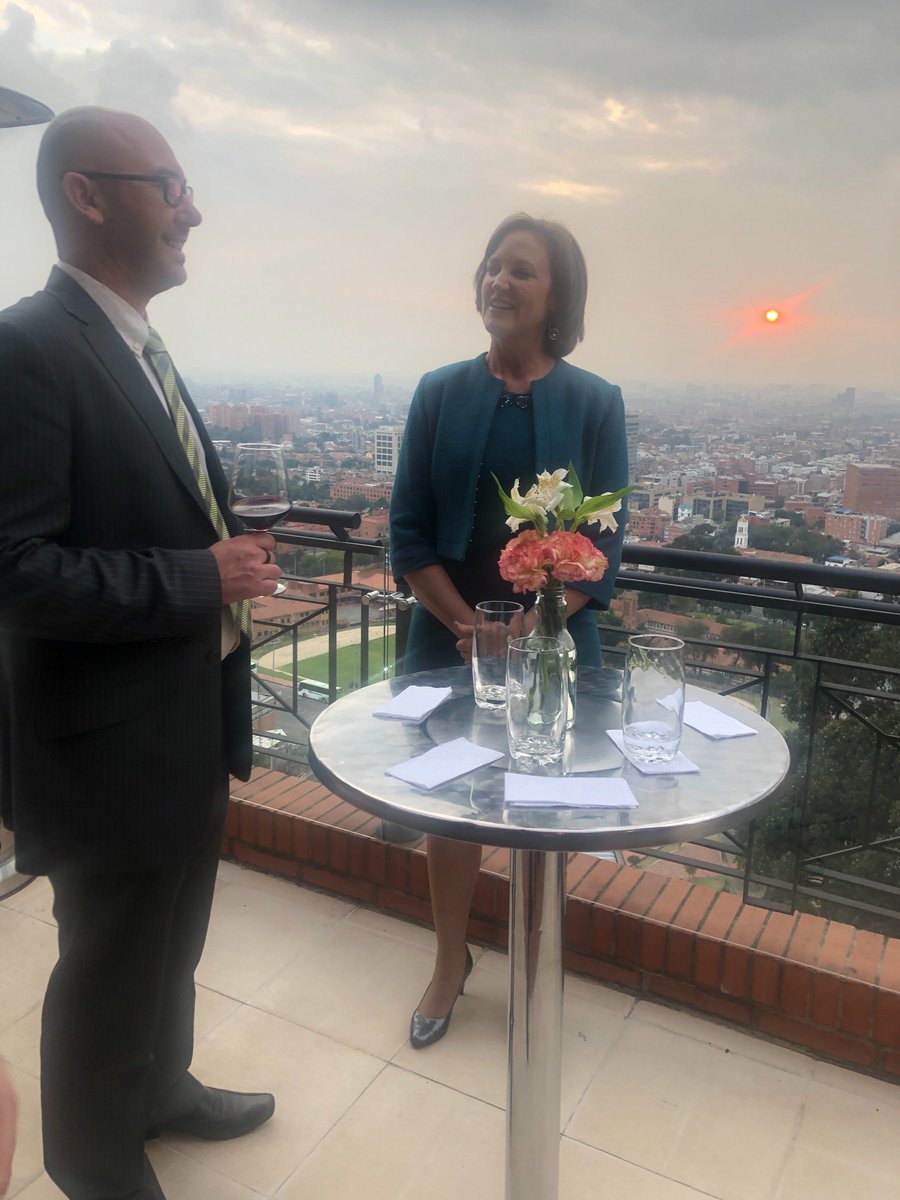 Envirosuite_Ltd's tweet photo. @SchollMatt and Australian Ambassador to Colombia Sophie Davies @AusEmbCO enjoying the view of Bogota at the Ambassador's Residence Envirosuite's launch in #Colombia https://t.co/GqLnQ9V6IO