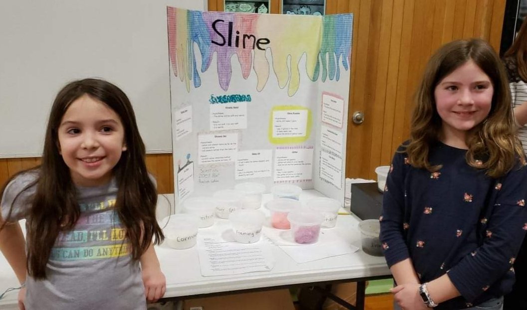BethB_81's tweet photo. Zoey and her friend Penelope at the MES Science Fair. They tested how adding different materials would change the texture of the slime. They worked so hard! Very proud of them. #sciencerocks https://t.co/fzCsr5cbQ0