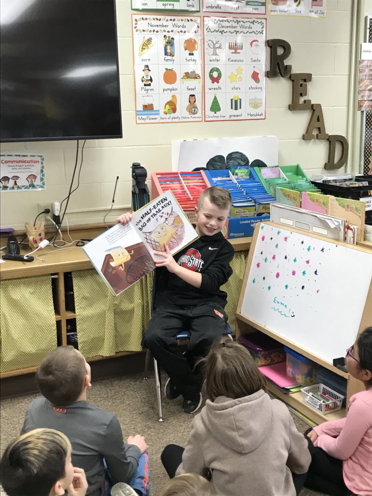 Strohscher2nd's tweet photo. March Madness: Battle of the Books 📚 
Round One: 
Reading their favorite book to the class. #TrojanTrue https://t.co/qBt2IQDjnD