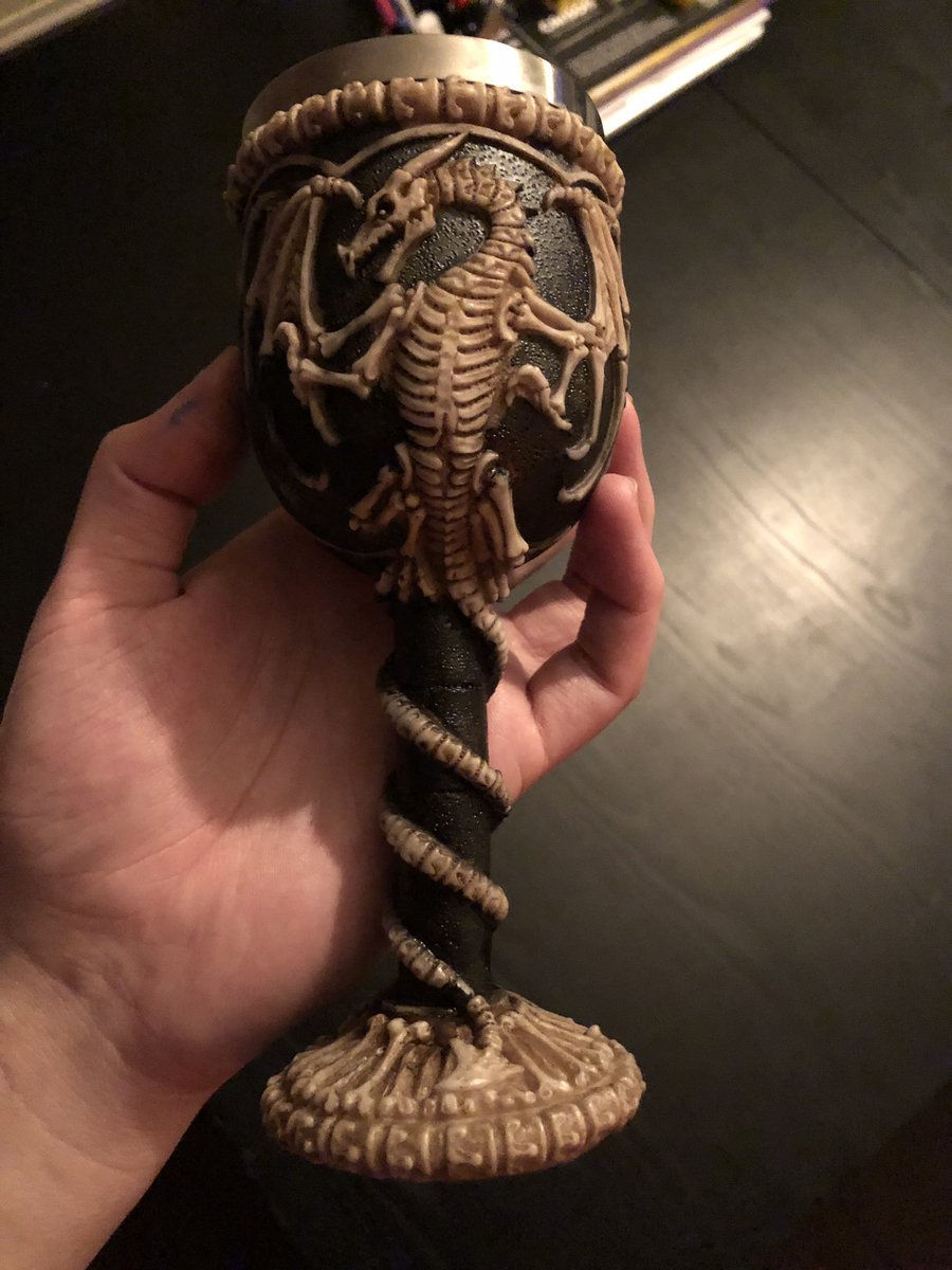 skullmandible's tweet photo. they were exploring an ancient vineyard so I got them some dragon goblets and stripped the label off some sparkling grape juice and replaced it with a handmade distressed draconic label https://t.co/PuRnKFjYT9