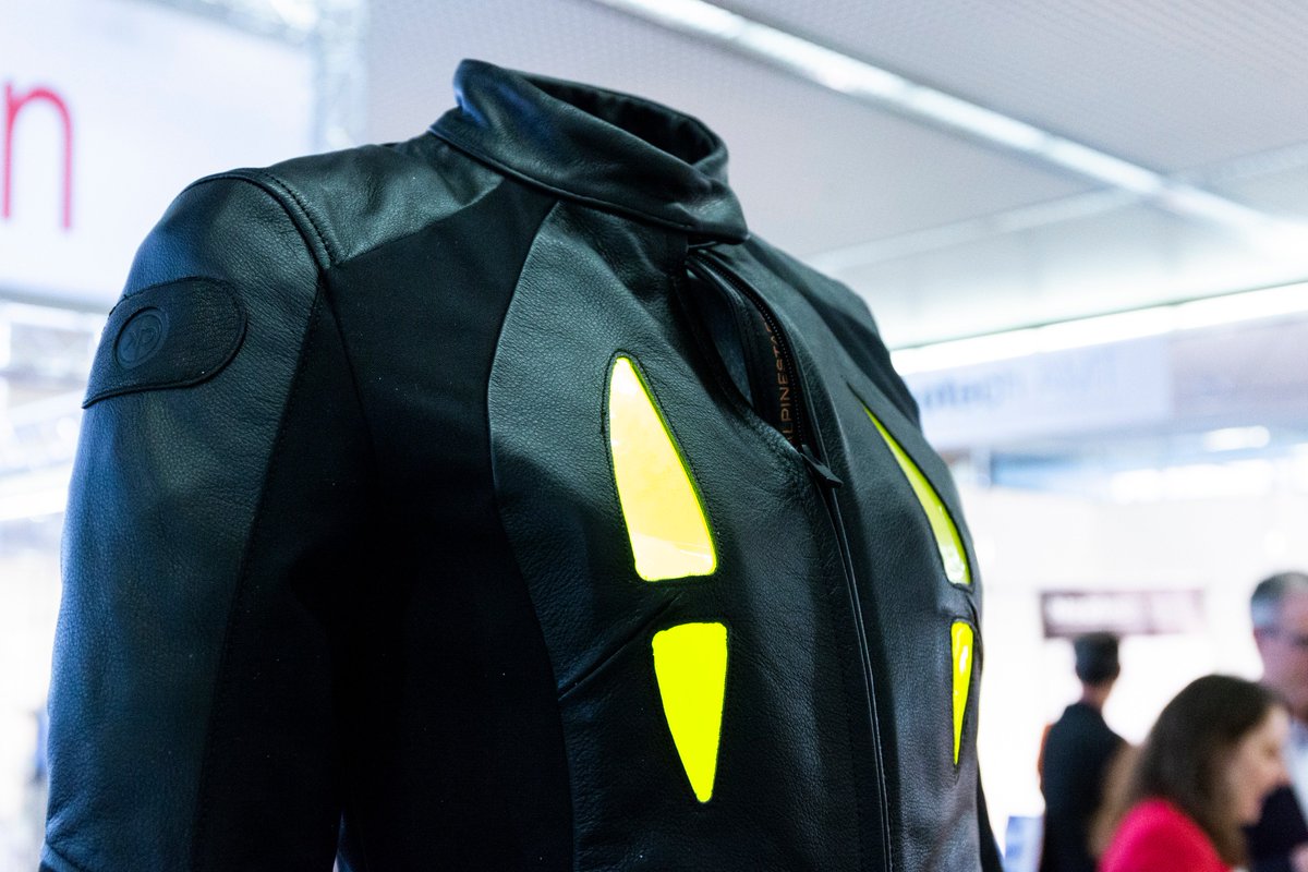LOPECMunich's tweet photo. Thermocouples, sensors, light - #printedelectronics are now so robust and flexible that they turn clothes into innovative e-textiles. #LOPEC2019 shows that printed electronics are increasingly becoming the innovation engine of the textile and #fashionindustry. https://t.co/zNy6pXA4qa