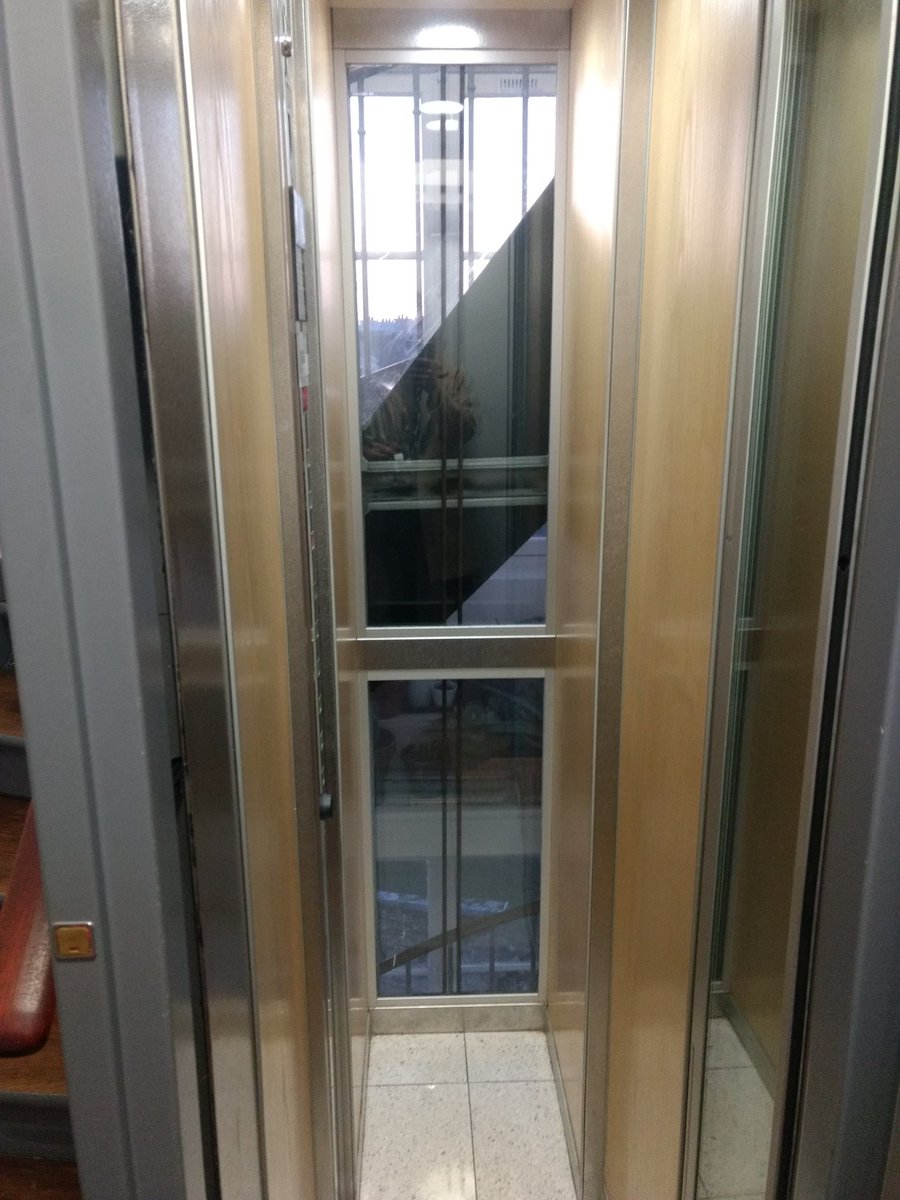 karmecon's tweet photo. This must be the world's smallest elevator! #shoulderwidth #Paris https://t.co/m8BdiF5QpE