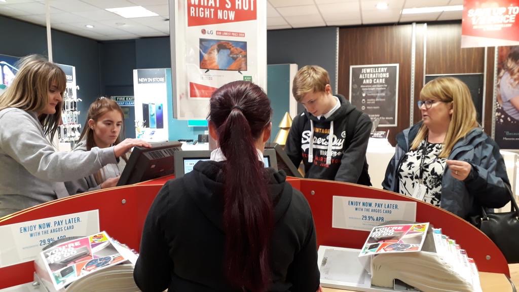 Attending a shopping trip and using our budgeting skills