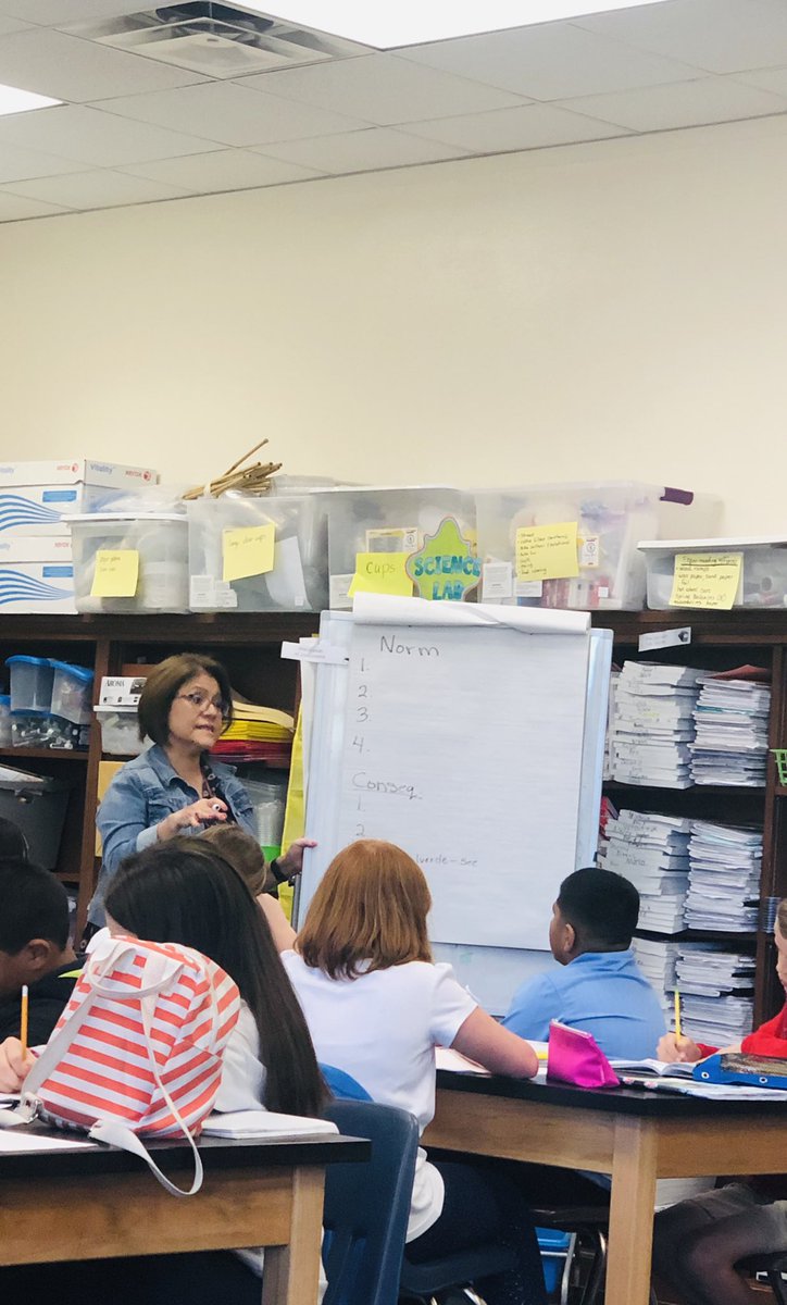 SamBooherEdu's tweet photo. Ms. @OVal_SweetLilyB is facilitating the students through creating norms/consequences for their upcoming unit. Just like in our professions, norms should be revisited and committed to at the start of each meeting or project! #engage2learn @engage_learning #FWISDLearningModel https://t.co/XPGtn0182F