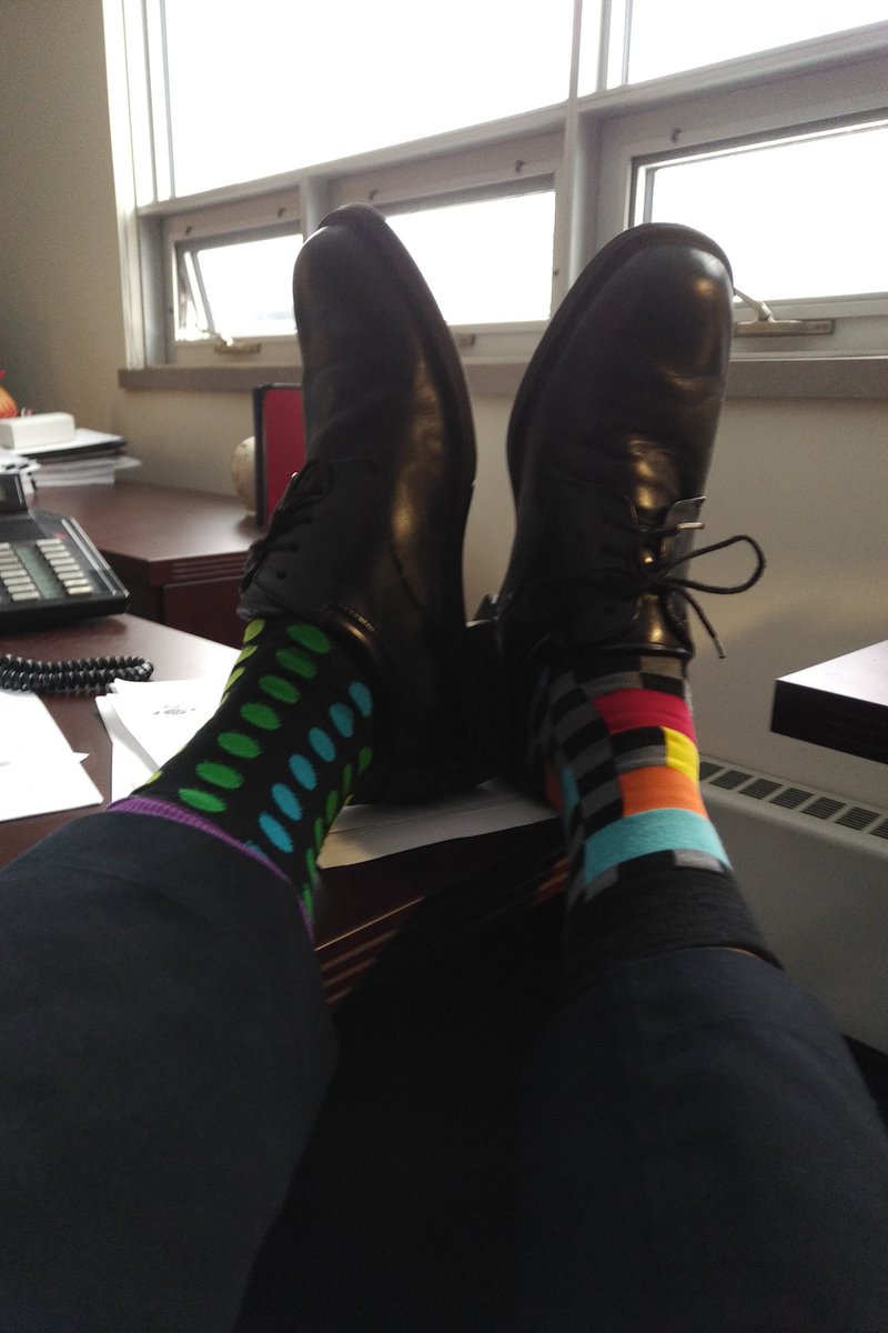 ChiefDevine's tweet image. ￼

Why the Socks ? Because it's Down's Syndrome Awareness Day and chromosomes look like socks and people with Down Syndrome have an extra chromosome! “Lots of Socks” is know around the world as being associated with Down Syndrome. 
Help stop the stigma !