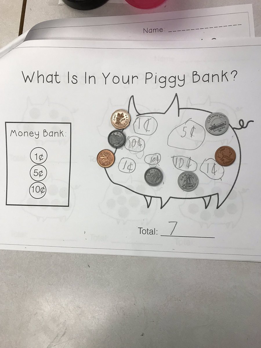 What’s In Your Piggy Bank? Grade 1s working on identifying coins and adding values.