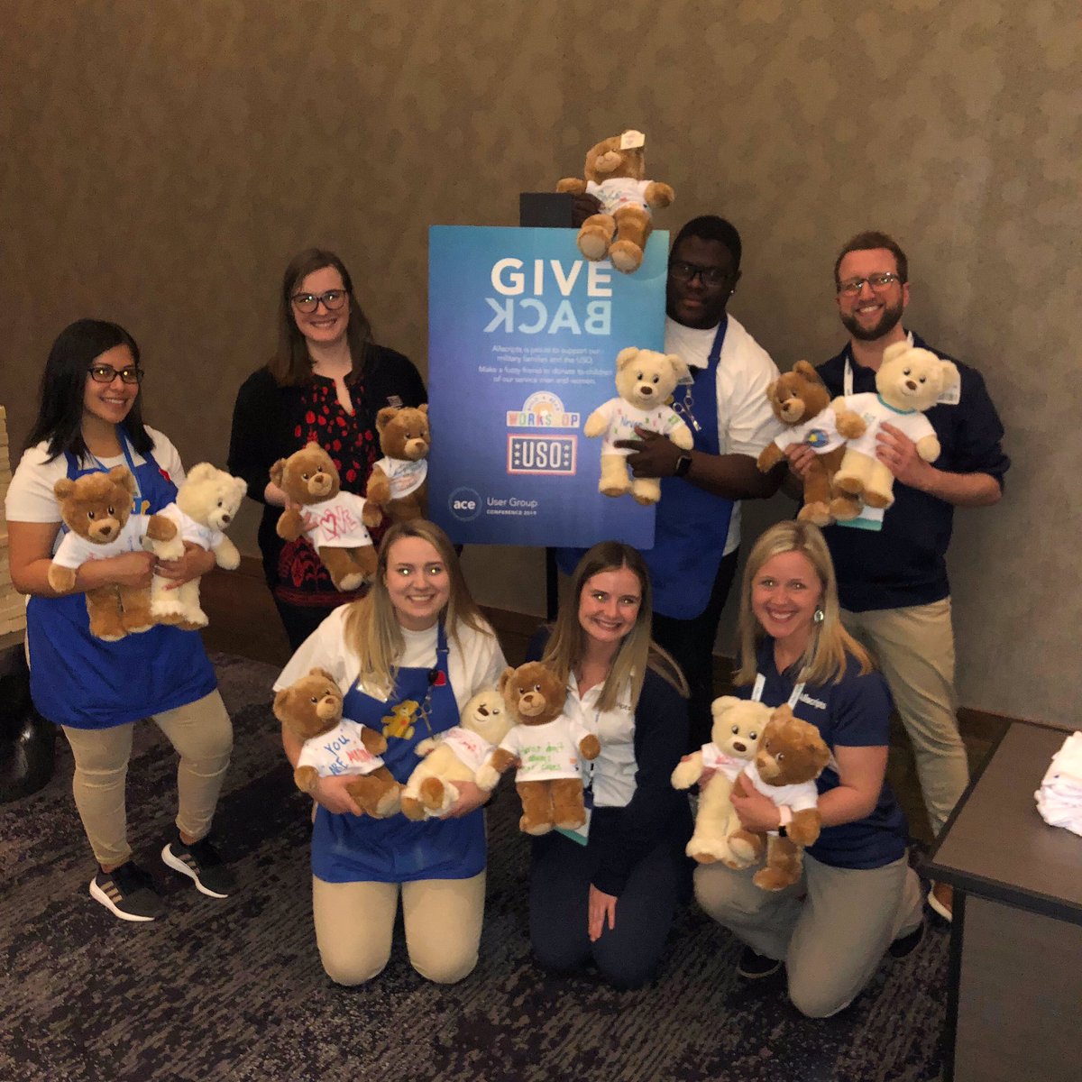 AlteraHealth's tweet photo. During our Client Appreciation Celebration @ Allscripts User Group Conference, clients & Allscripts staff designed t-shirts for teddy bears that will be provided to children of military service members. Thanks to our partners @buildabear & @USO_of_Illinois! #allscriptsgivesback https://t.co/dCUK27B2nf