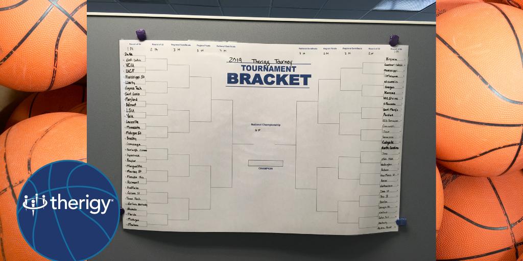 Therigy's tweet photo. It's that time of year again! The big board is up in our office and everyone's gotten their picks in - we're ready for March Madness! https://t.co/msAdD9F0NE