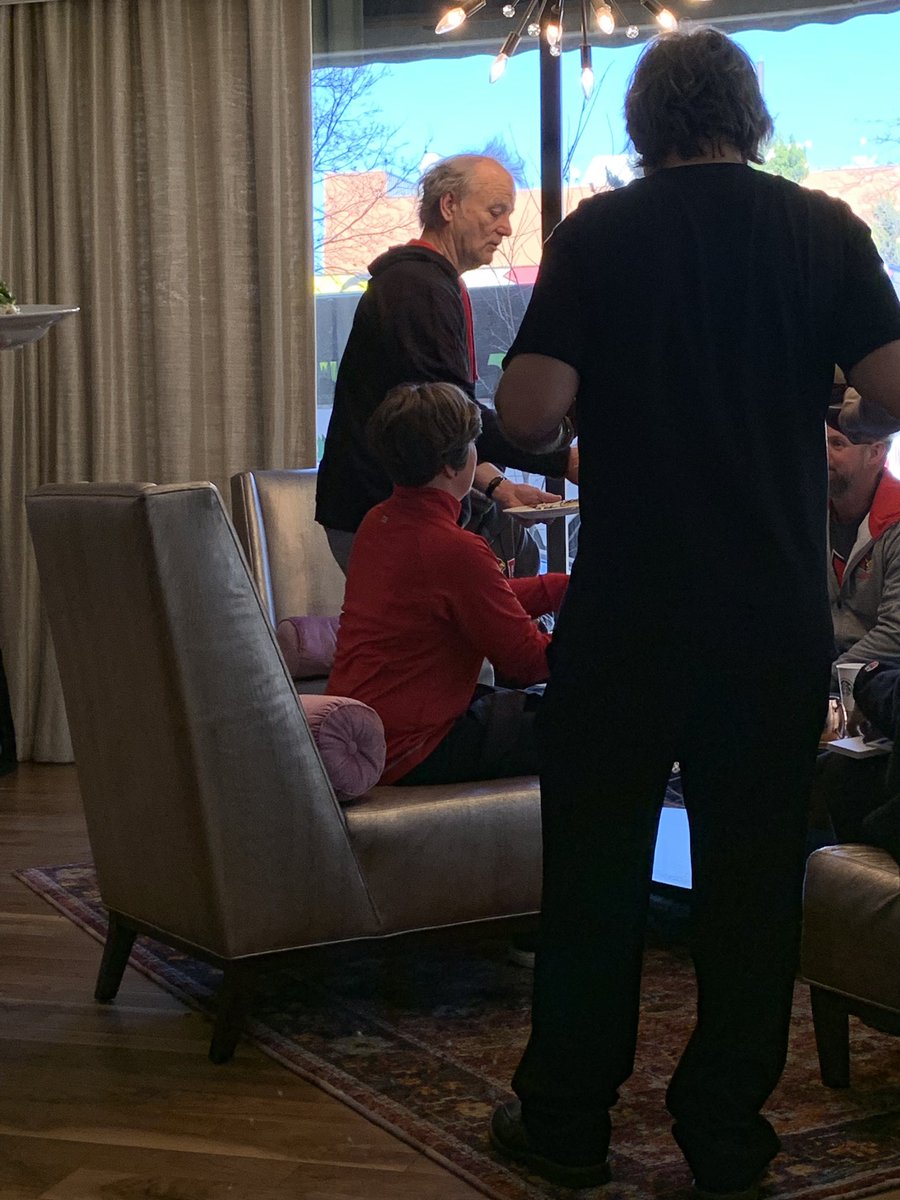 Bill Murray bought the whole bar food and is serving it to UofL folks here in the team hotel bar himself.