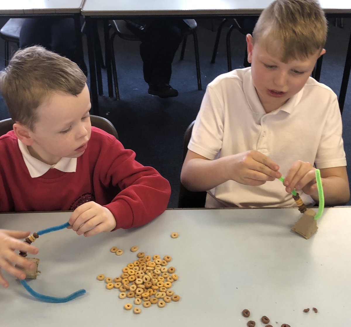 StDavidsCIW's tweet photo. Threading is made easier with the help of a great guide. #crossagelearning #birdtreats https://t.co/8pXKaiXBMk