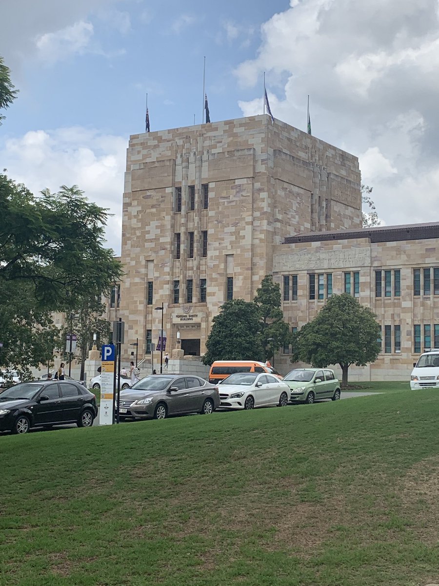 frenchatuq's tweet photo. UQ flags at half mast in solidarity with New Zealand. #NoRoomforRacism https://t.co/vVEDzj9aZN