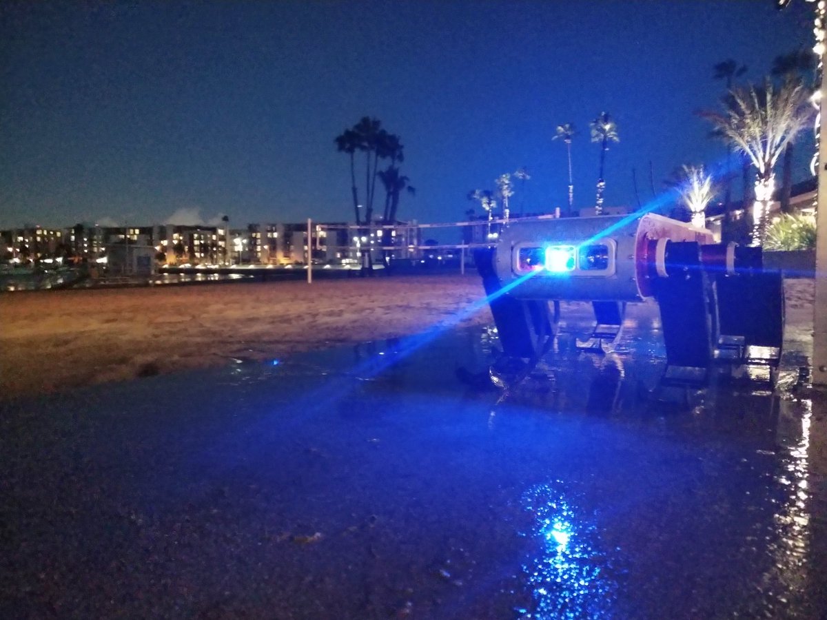 Taking a shower after a long day swimming. Time to go to Disneyland!