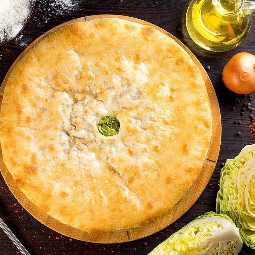 Три осетинских пирога. Осетинский пирог. Осетинский пирог картофджин. Калинина наталья осетинский пирог. Осетинские пироги пошагово.