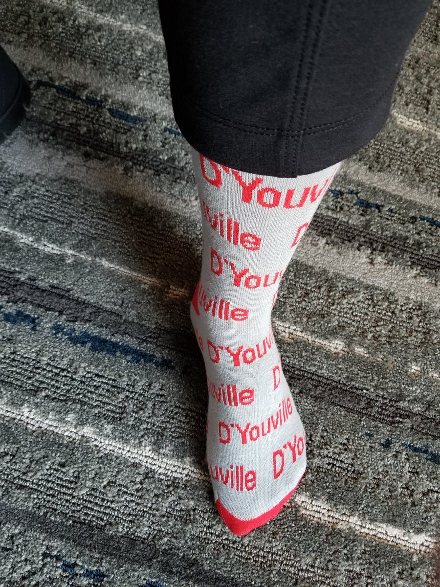 FoxGarrity's tweet image. What's more strange: the name of my school or the fact that these socks were a valentine's gift from the administration?#AEFP2019SockChallenge