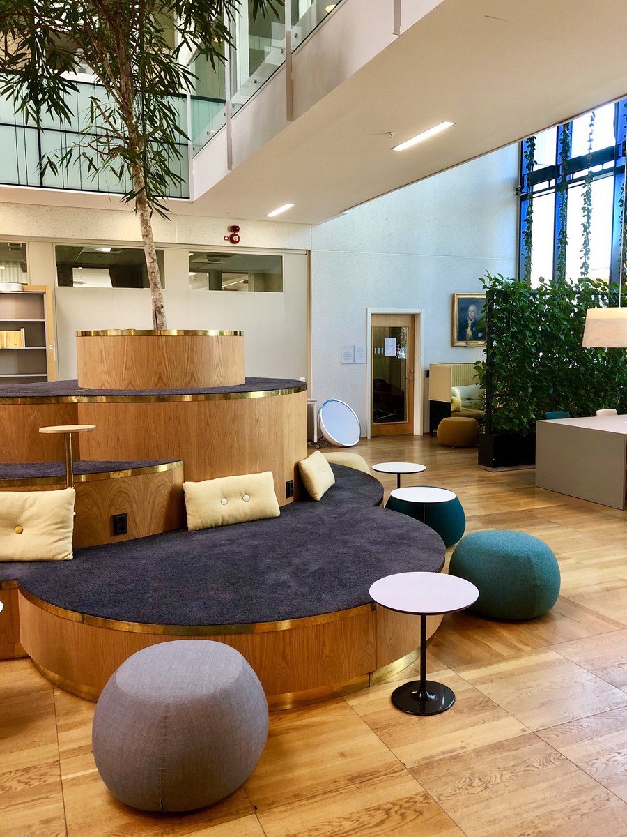 andypriestner's tweet image. A perfect example of form over function in a library: a very large and exposed multi-level seating island with a real tree at the top. Users prefer to sit at the more private and normal study desks nearby. #formoverfunction #uxlibs #uxdesign