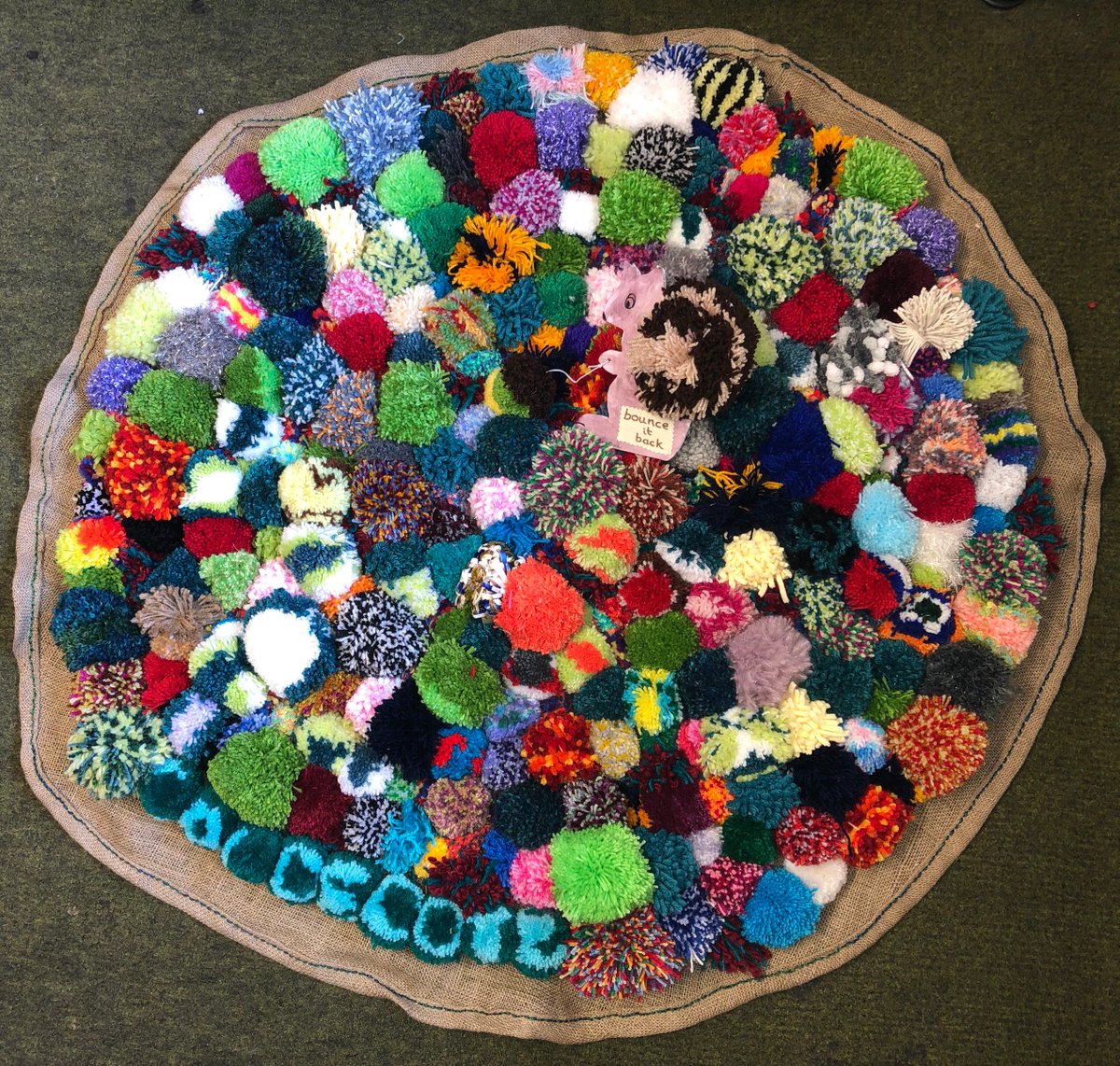 nhsswft's tweet photo. As part of 'chatter matters' week, @timetotalkwarks worked with a wide range of groups to create a pom pom rug. The rug is a way to show that we need to get down to childrens' level for two-way ‘bounce it back’ interactions to happen, crucial for speech &amp; language development. https://t.co/btt8L2b58j
