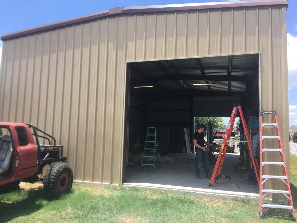 MikesOverheadD3's tweet photo. Need a drive thru metal building? We will cut out an existing wall, reframe, and install that roll up door you always wanted. Making trailer access more easy, as well as more airflow. #metalbuilding #barn #rollupdoor https://t.co/KVSTlVzch8