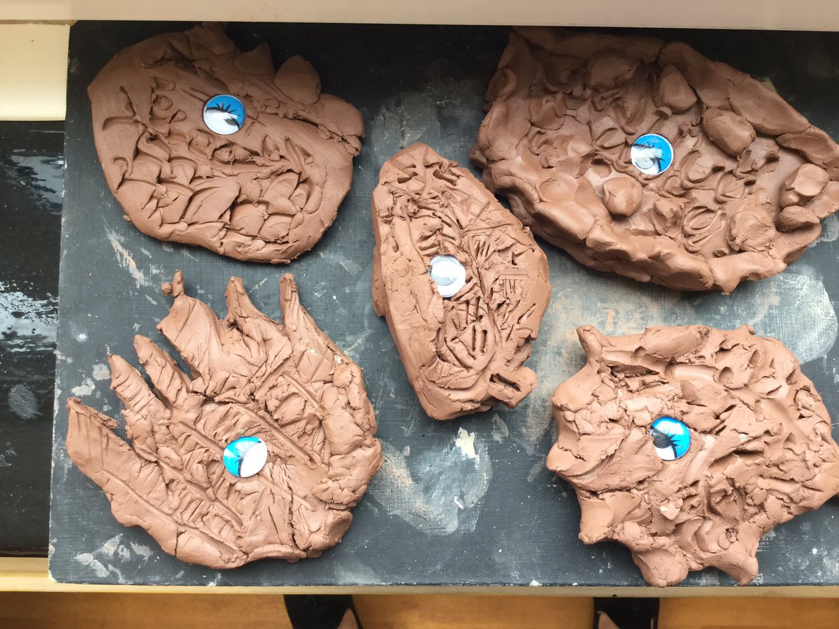 ssao_y2's tweet photo. Look at Year 2’s spooky dragon eyes 👀 we have been practising using tools to make patterns in clay https://t.co/suzJT4YHDd