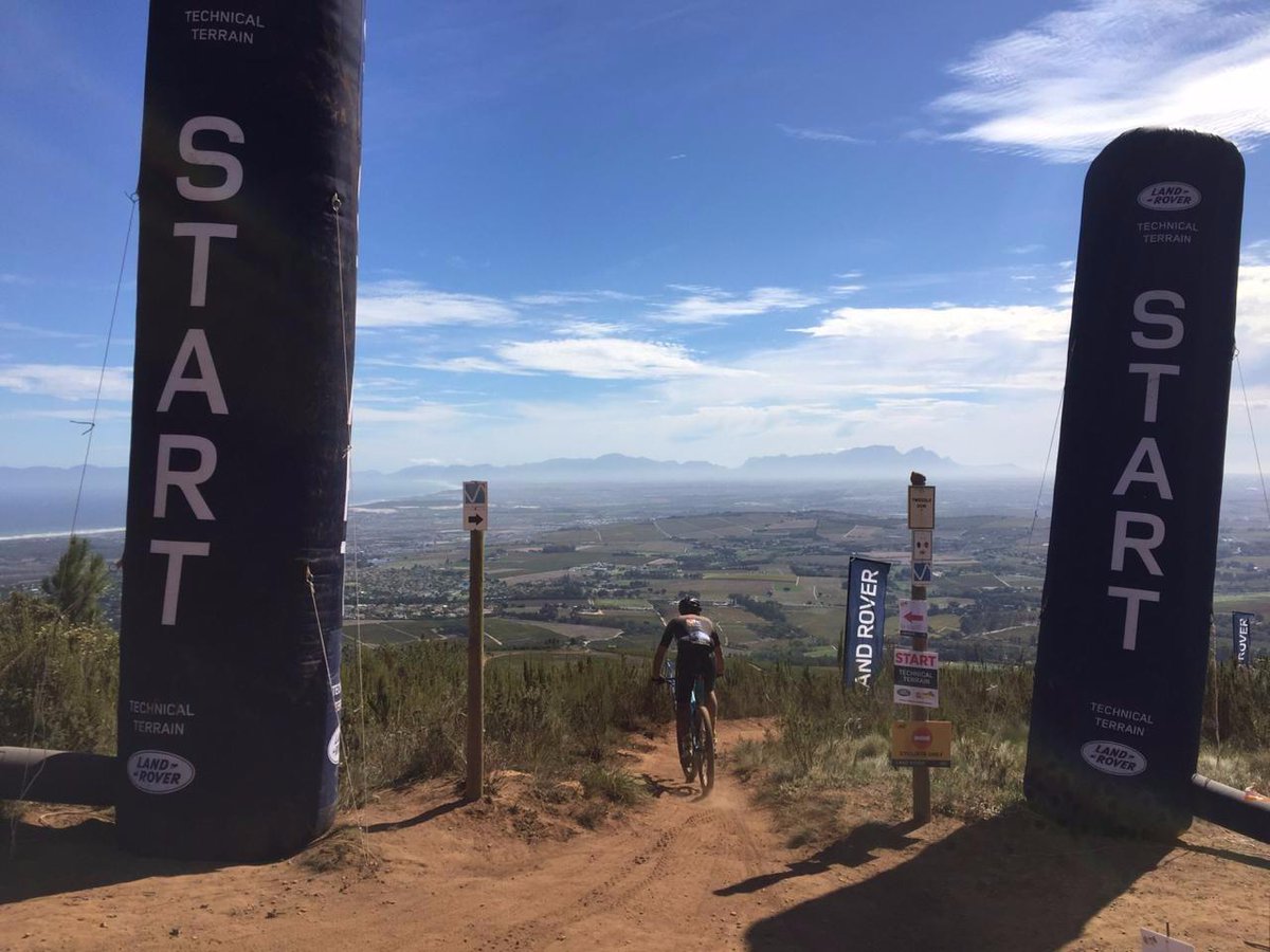 CapeEpic's tweet photo. Word from the Hyenas: "Itโs been a killer of a Queen Stage for the backmarkers. Great, but tough riding is pushing the back to their max. Last rider into @LandRoverZA #TechnicalTerrain at 73km" https://t.co/jVhRBxP0Rv