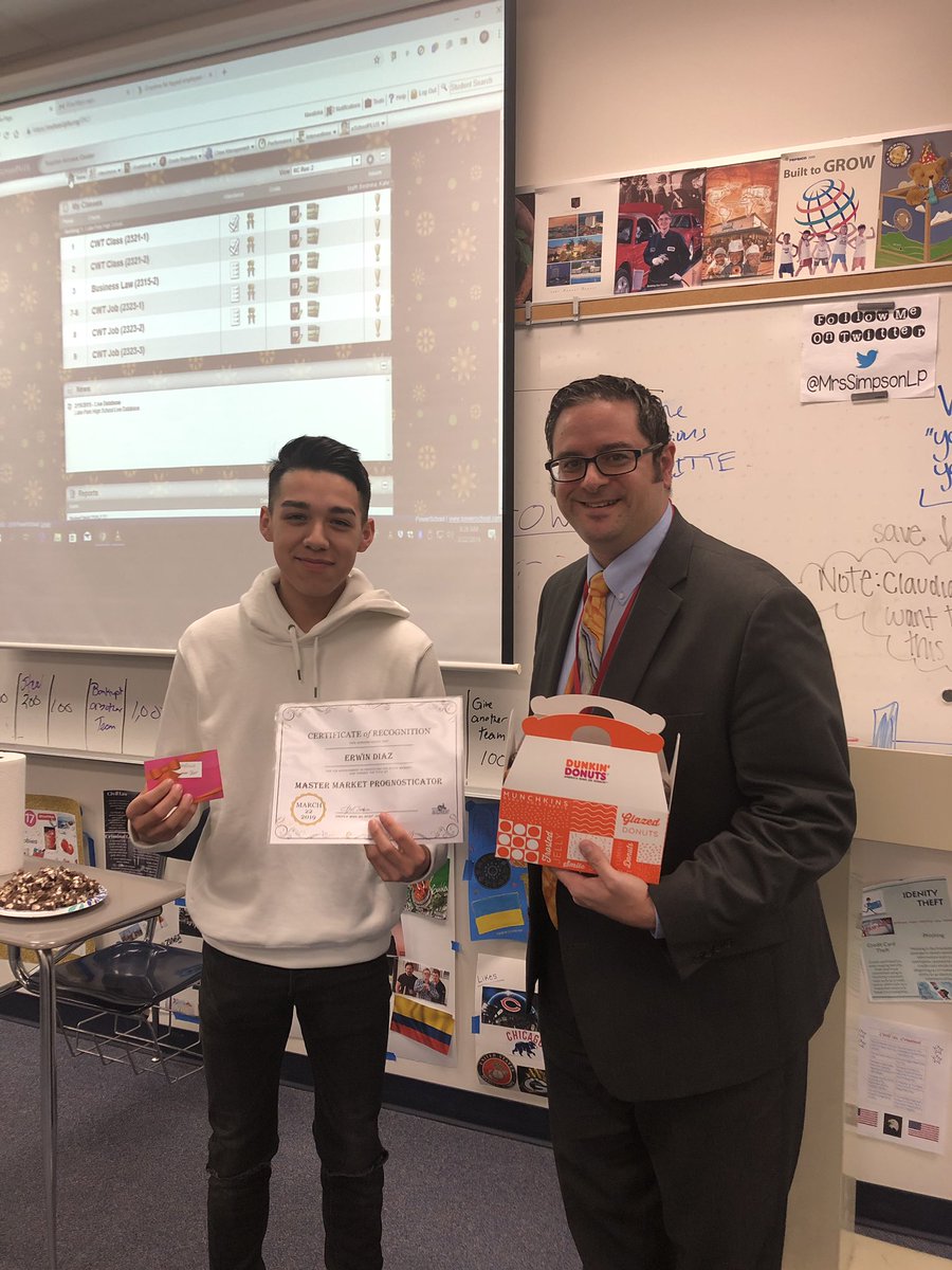 Erwin bet our financial guest speaker that the market would end down for the year.....Erwin won!!!