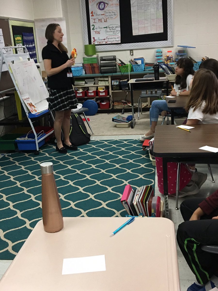 Ss learning about cells and antibodies at AES STEM  Career Day.