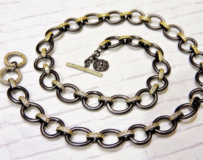 Your new "this piece goes amazing with everything" necklace from Freida Rothman designs. Oxidized silver with gold....a beautiful combination.