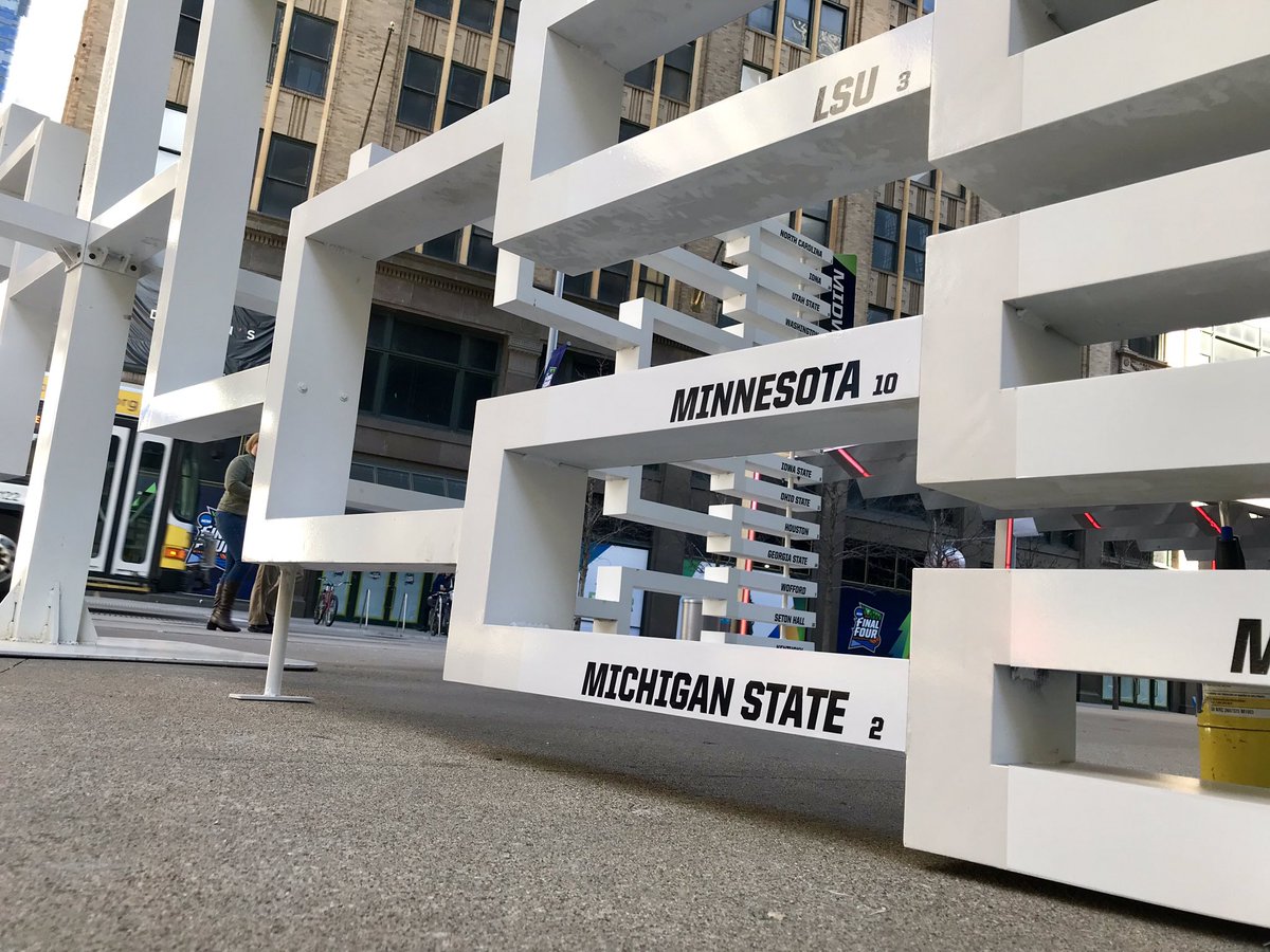 pacecarr's tweet photo. My obsession with the giant bracket on Nicollet continues ... 
So the updating is done by @dolanprinting, a local printing and graphics shop, and this friendly two-person team was out there this morning adding yesterday’s winners, including @GopherMBB, to Round 2. https://t.co/fqtasHwccj