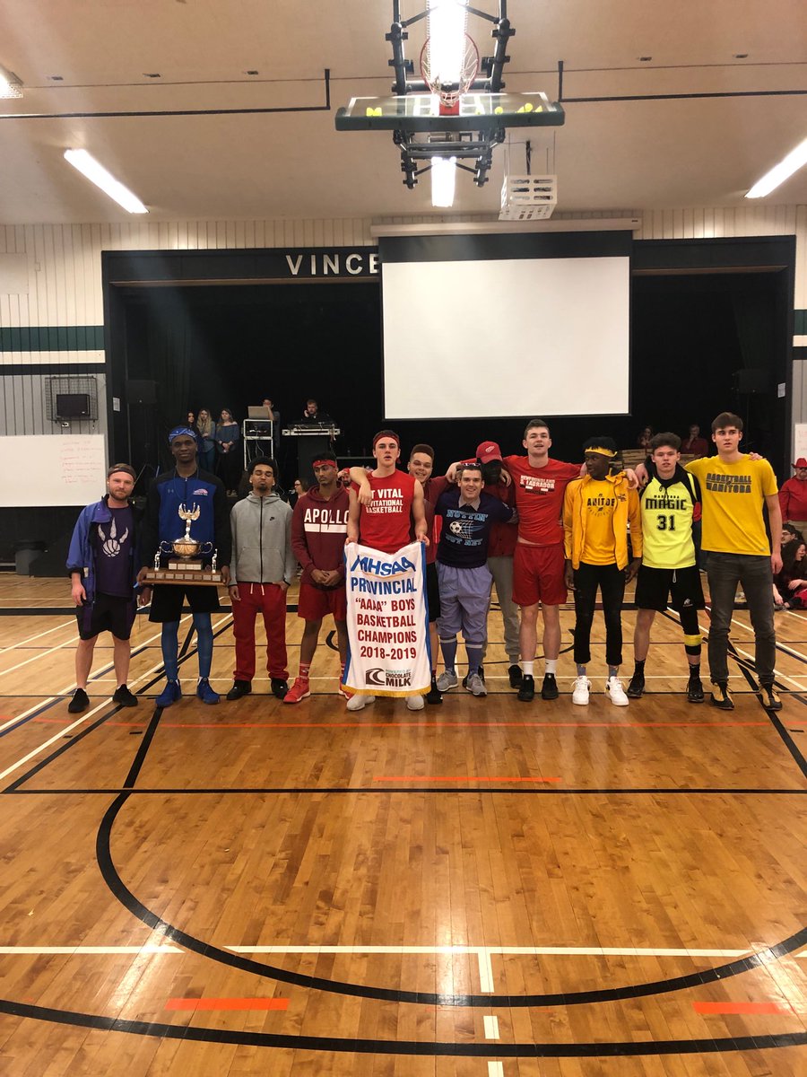 tcarvey's tweet photo. Shout out to our varsity boys provincial bball champs. Showing off the hardware at our annual #icvmcgymriot https://t.co/eH2HApr8S8