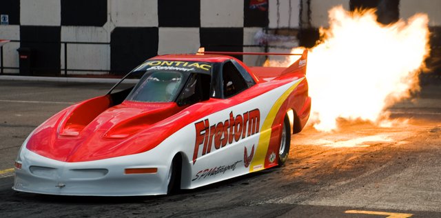 SRaceway's tweet photo. Roger Goring's not afraid of the 'Big Black Track'! No he's strapped into his 'awesome jet car' Firestorm. Memories of Dave Hollis' commentaries at the British Mini Showdown 2009. Photo by Jeni Long. https://t.co/DJgTRA8JTa