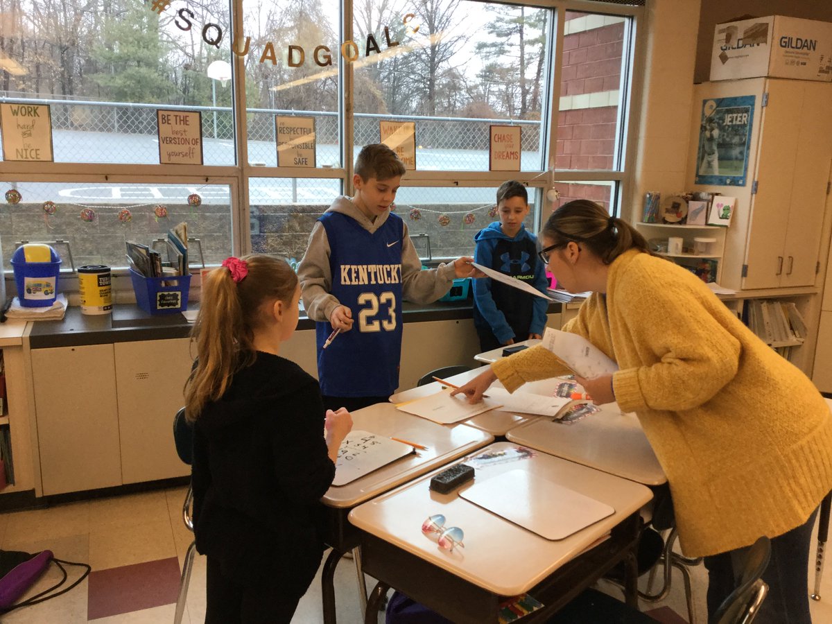 A little March Madness math scavenger hunt today with <a href="/CBJbrennan/">Joanna Brennan</a> fifth grade math class.  #tituspride #Southside