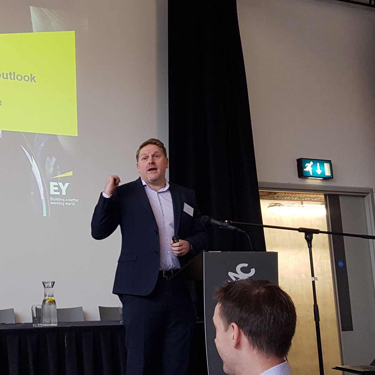 dptfinance's tweet photo. Informative #NICS Economist Profession Conference @TheMACBelfast discussing priorities for the profession. Insightful panel discussion chaired by NICS Chief Economist Tony Simpson with Jasmina Behan @IGEESIRL &amp; Ibukun Ibitoye @GES_UK &amp; presentation from Neil Gibson @EY_Ireland https://t.co/pUHfCRq6O8