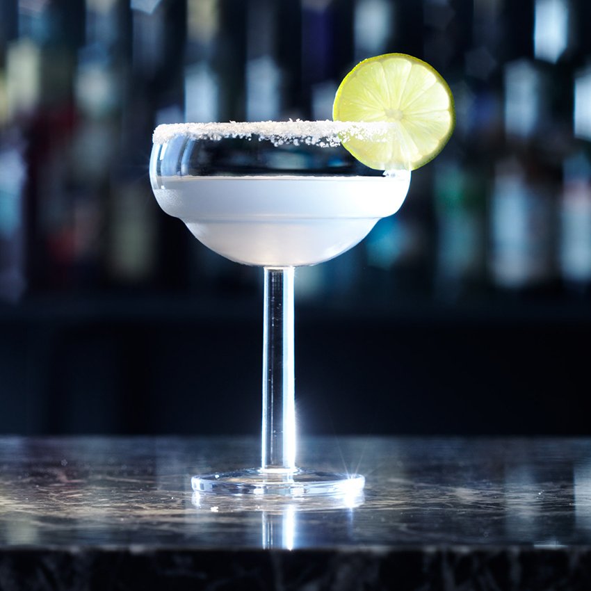 With its signature zesty combination of lime &amp; tequila, what better way to liven up the weekend than with a classic Margarita?
Combine 60ml tequila, 20ml triple sec &amp; 20ml fresh lime juice in a cocktail shaker &amp; top up with ice. Shake vigorously &amp; strain into a cocktail coupe.