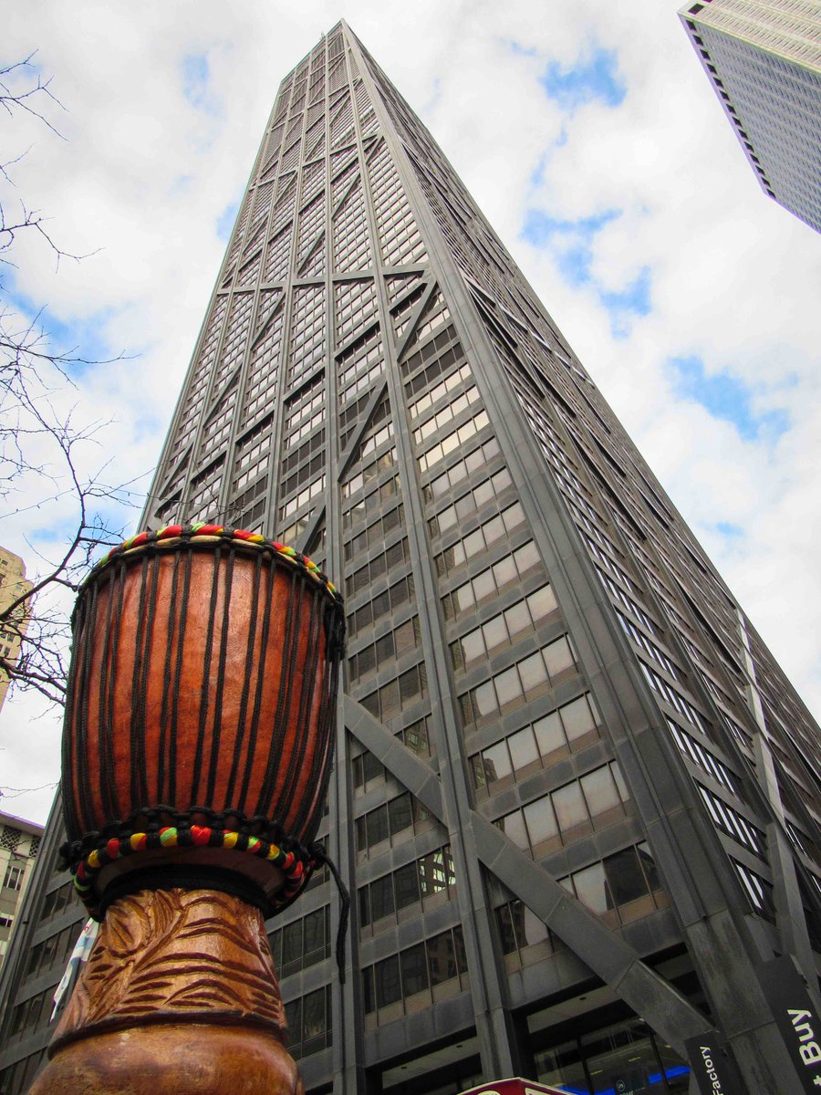 DjembeTheShow's tweet photo. Our #Djembe was so excited to stop by the #HancockBuilding and loved standing tall next to the iconic skyscraper. #DjembeTheShow #YearOfChicagoTheater #percussion #drums #beat #rhythm #groove #music #ChicagoTheater #AllTogetherNow https://t.co/CQdmVKkzTL