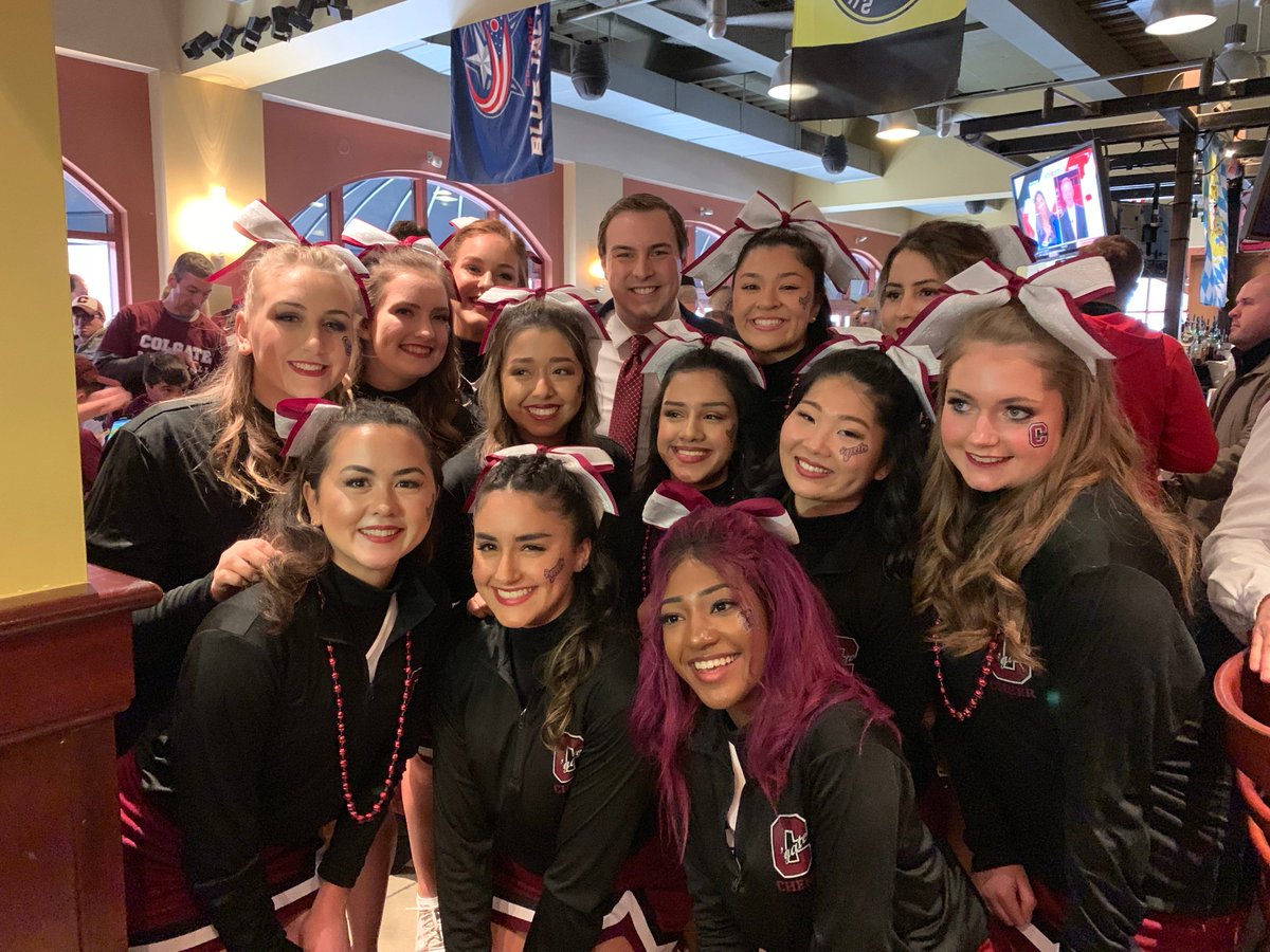 AndrewDonovan's tweet photo. #ColgateCountry really appreciates @NewsChannel9 making the trip to Columbus. Here I am with the @ColgateUniv cheerleaders and my new friends, the Light family, whose son Zach Light will take the court with the @ColgateMBB team in moments. https://t.co/VCXXbTxEyI