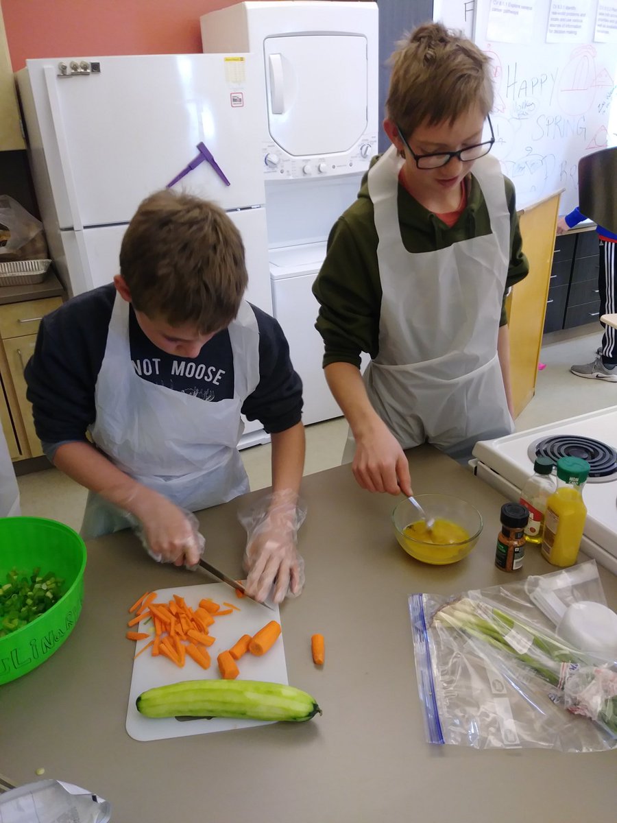 VelardeJolene's tweet photo. In addition to cheeseburger sliders, side salad... Kade cutting the vegetables and Andrew making the dressing. #homemade #culinary @Fremont1_LMS @LanderSchools https://t.co/xxFmKFeit2