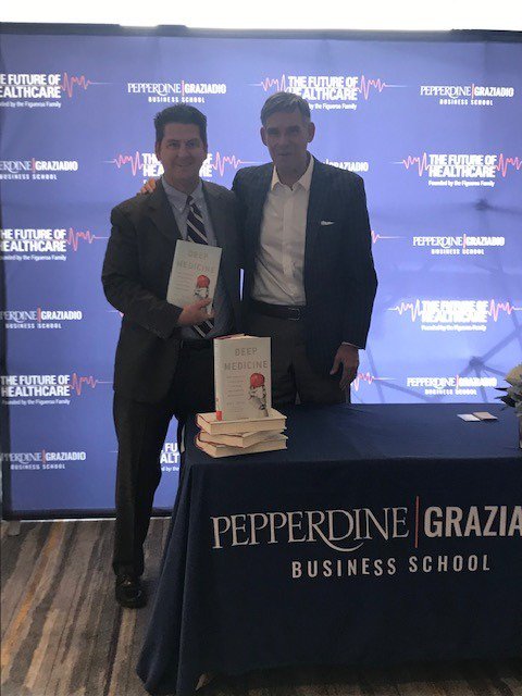 KPpublicaffairs's tweet photo. Yesterday, KP's @patrickgeorge met up with legendary physician, @EricTopol, author of “Deep Medicine: How Artificial Intelligence Can Make Healthcare Human Again.” Congrats to our client @GraziadioSchool for an amazing Healthcare Symposium. https://t.co/q5g79NqGs4 https://t.co/QuuxTW3Fb6