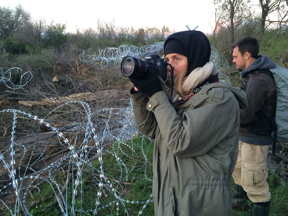 InsideMyHeartdf's tweet photo. At the height of the European refugee crisis, over 1.8 million people crossed the EU’s borders illegally. Debra Kellner stands at the Greece-Macedonia border in this photo from 2016. Inside My Heart will soon be available for educational screenings. 
https://t.co/S1Ps0ukiff https://t.co/E61Ij595LW