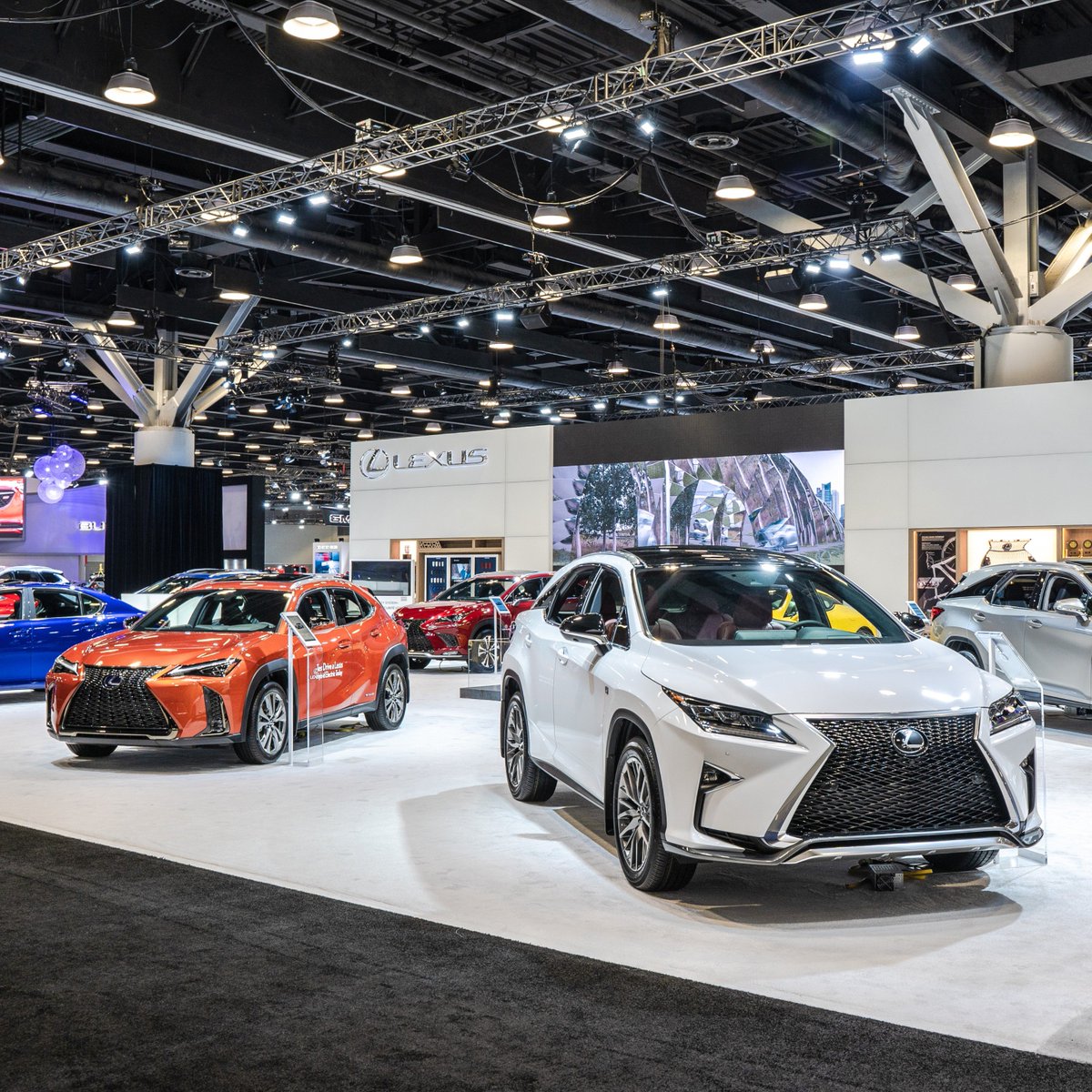 lexuscanada's tweet photo. Revel in the stunning #Lexus line-up at the @VanAutoShow, now on until Sunday, March 24. Visit our show booth to see self-charging hybrid electric #LexusUX, the exhilarating F SPORT #LexusRX, the radiant #LexusGSF and many more. #LexusAutoShow #VanAutoShow https://t.co/yUrX7Dyqut