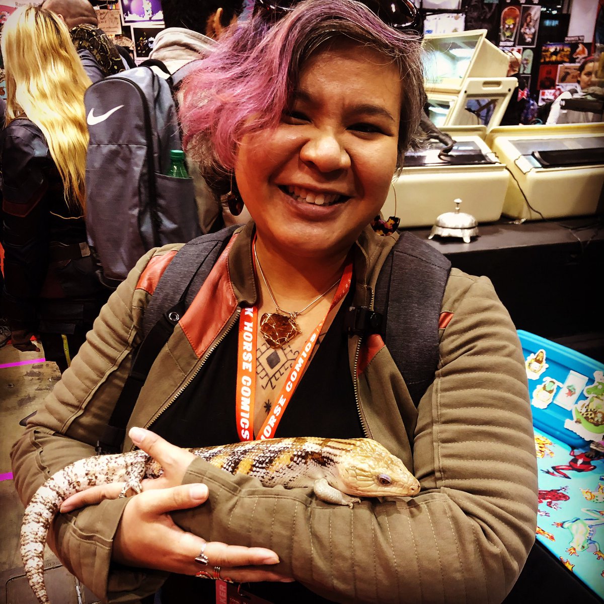 GeekMelange's tweet photo. So this happened at #C2E2: made friends with a sweetie boa constrictor named Rocky &amp; a delightful gives-no-fucks blue tongue skink. Give the @FriendsofScales folks some 💖 at the con tomorrow, they’re great! https://t.co/CpITHPf06U