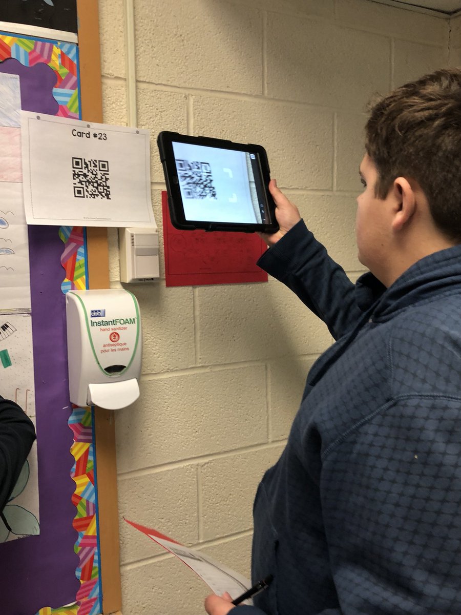 MrsSajda's tweet image. Grade 8s exploring the world of QR codes as part of a vocabulary scavenger hunt activity. Thanks @2peasandadog!#learningwithtechnology #grade8isgreat #geography