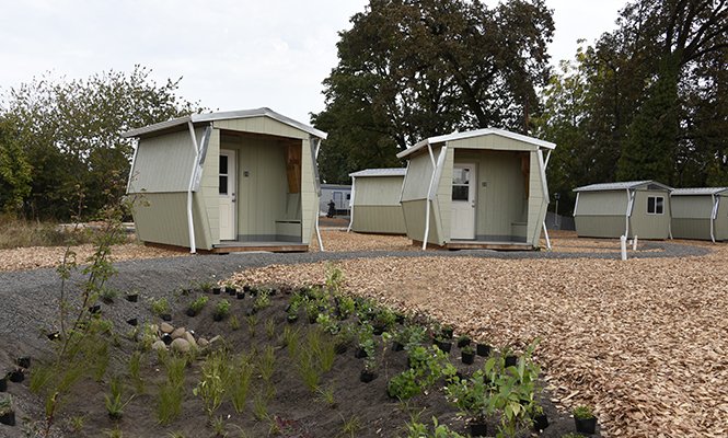 PSUArchitecture's tweet photo. PSU architecture and public interest design students used design to address houselessness among veterans, in a remarkable collaboration that resulted in the Clackamas County Veterans Village. Video + story at https://t.co/QinRbR8Yq3. @CPID_PDX #architecture #publicinterestdesign https://t.co/nTlwo3AjCf