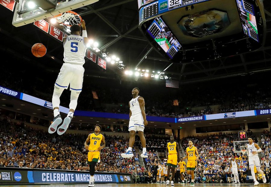 SBNation's tweet photo. This photo of Zion celebrating an RJ Barrett dunk is incredible https://t.co/DwdCtS1zAU