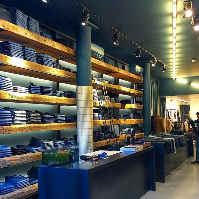 sarahesmallwood's tweet photo. Some denim retail therapy - made even more fun with the library ladder from which to grab your next pair of jeans. #retailtherapy #denim #shoptilyoudrop #amsterdam #blue #indigo #jeans #libraryladder #ladder #liveedge #shelves #organization #stacks #merc https://t.co/HlBOEGbjWv https://t.co/NoKBXQ5Iyb