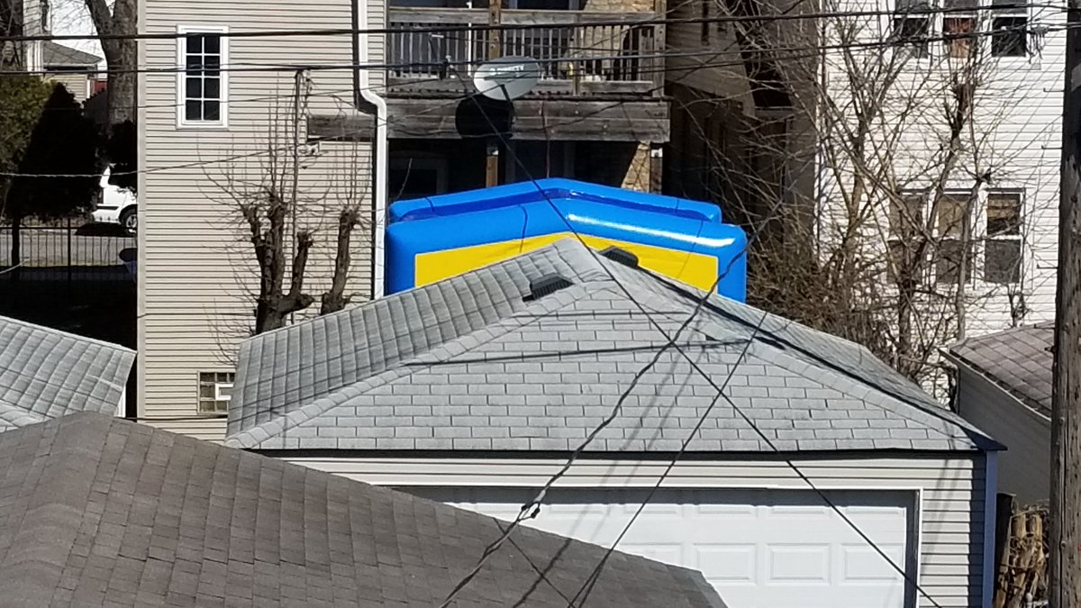 LiarOfOrpheus's tweet photo. My neighbors now have a bouncy castle in their yard. Why don't I have a bouncy castle? #neighborenvy https://t.co/iQnL0BsSY0